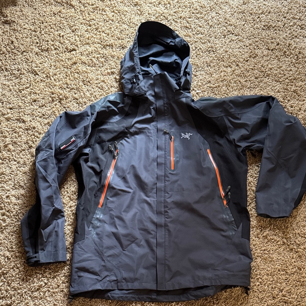 Arc'teryx Gray Jacket with Orange Zippers